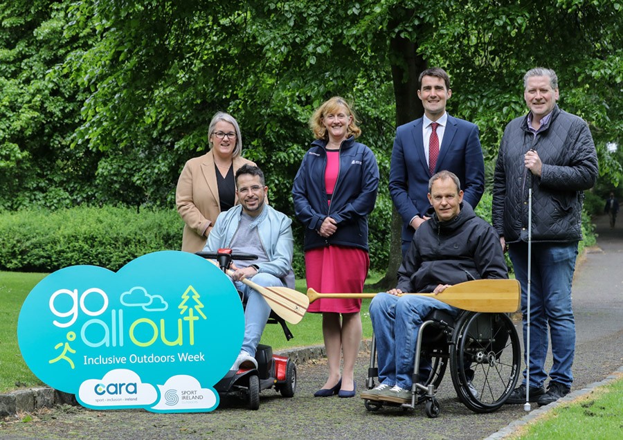 Go All Out launch photo with stakeholders being active outdoors